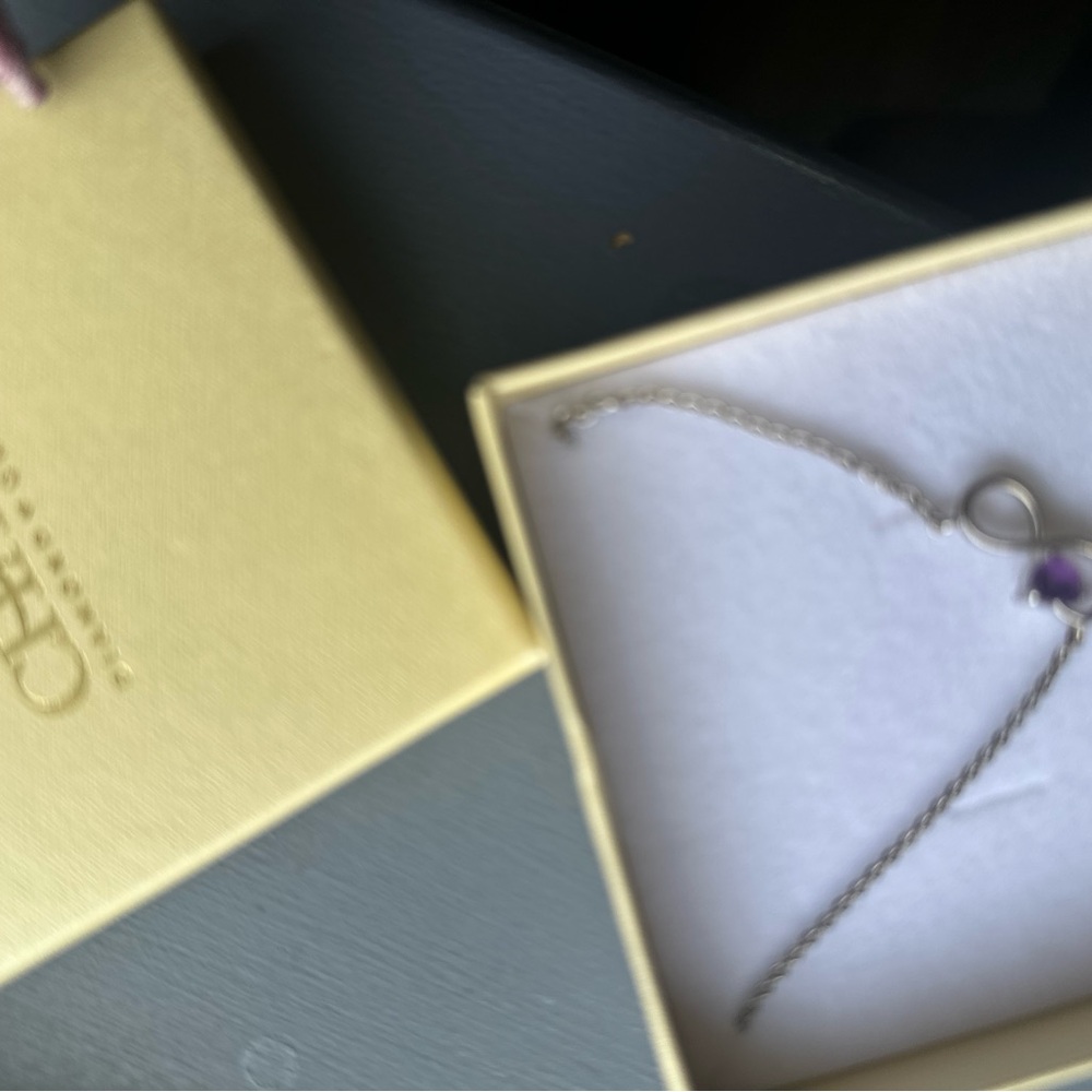 Elegant Silver Bracelet with Purple Accent